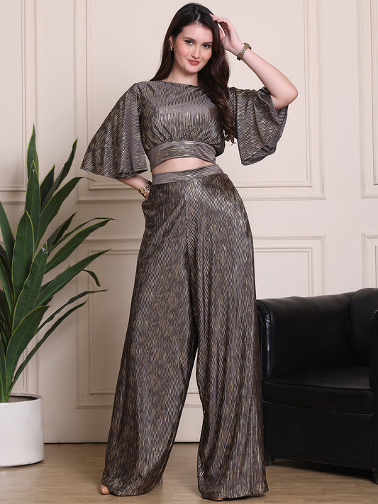 Exude Opulent Glow 2 Piece Cord, wide leg trouser with backless top with balloon sleeves