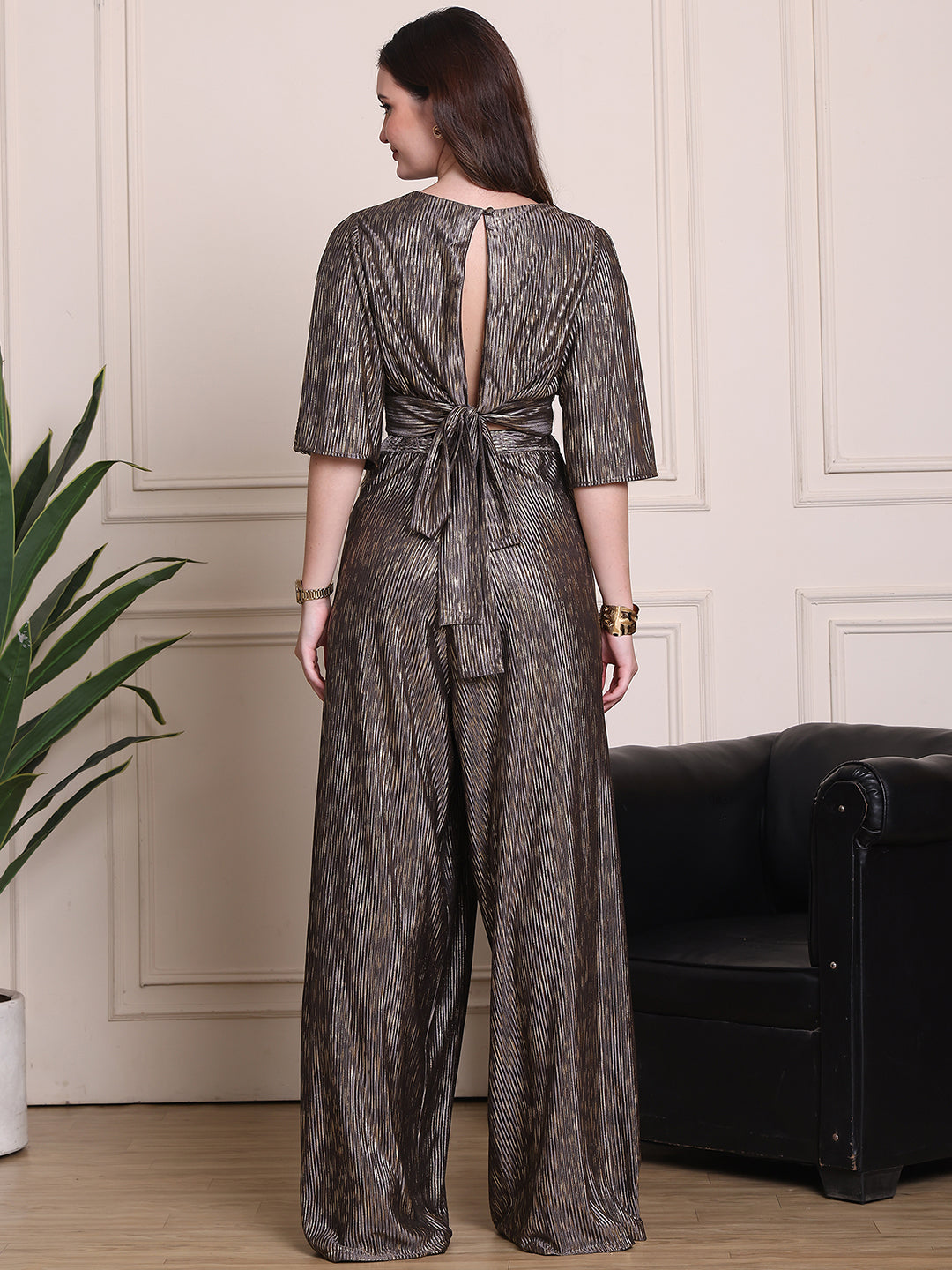 Exude Opulent Glow 2 Piece Cord, wide leg trouser with backless top with balloon sleeves, comes padded