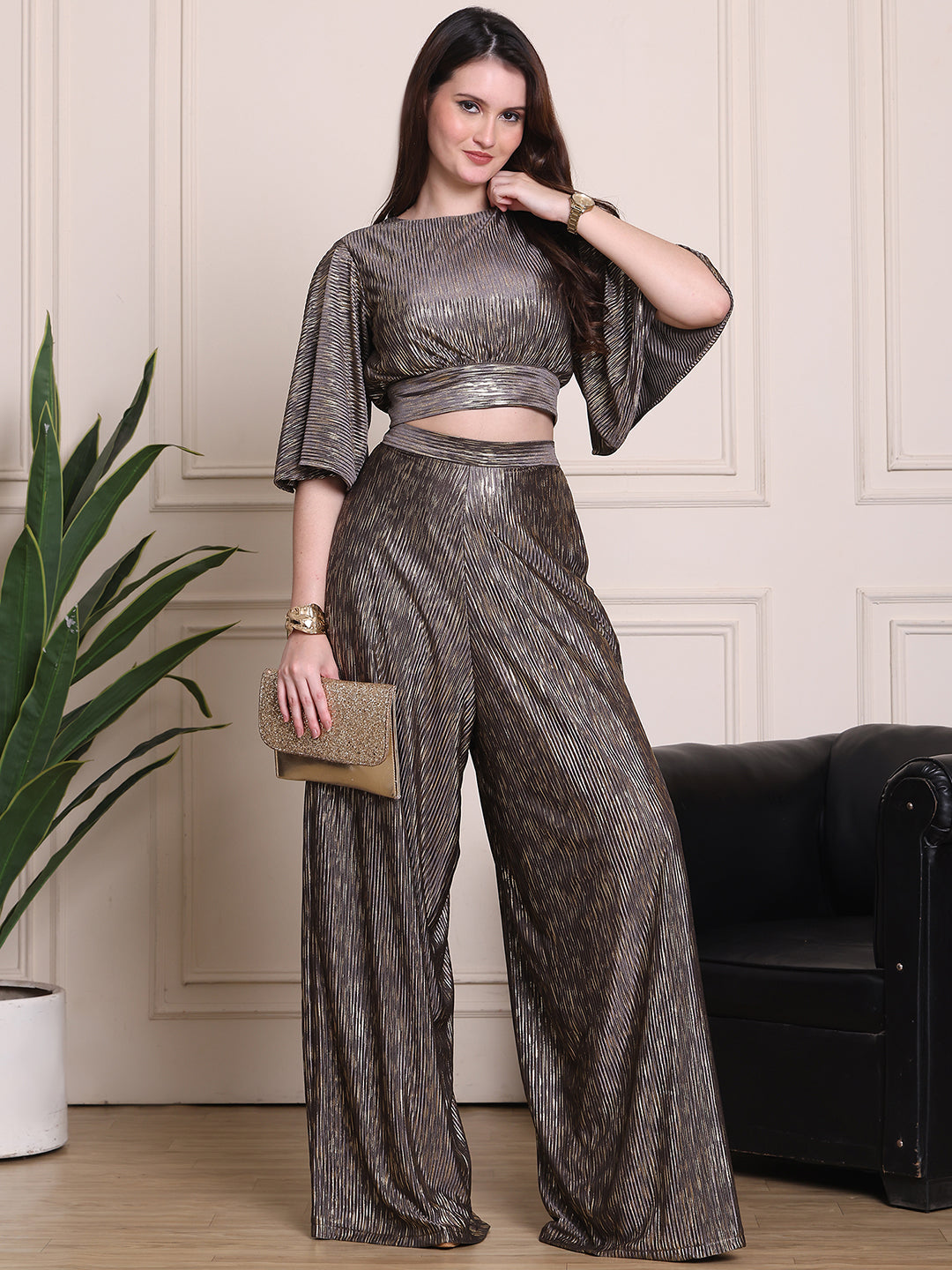 Exude Opulent Glow 2 Piece Cord, wide leg trouser with backless top with balloon sleeves, comes padded